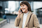 Communication, phone call and mature woman in the city talking, speaking having conversation online. Technology, connection and senior female walking in urban town using smartphone, smiling and happy