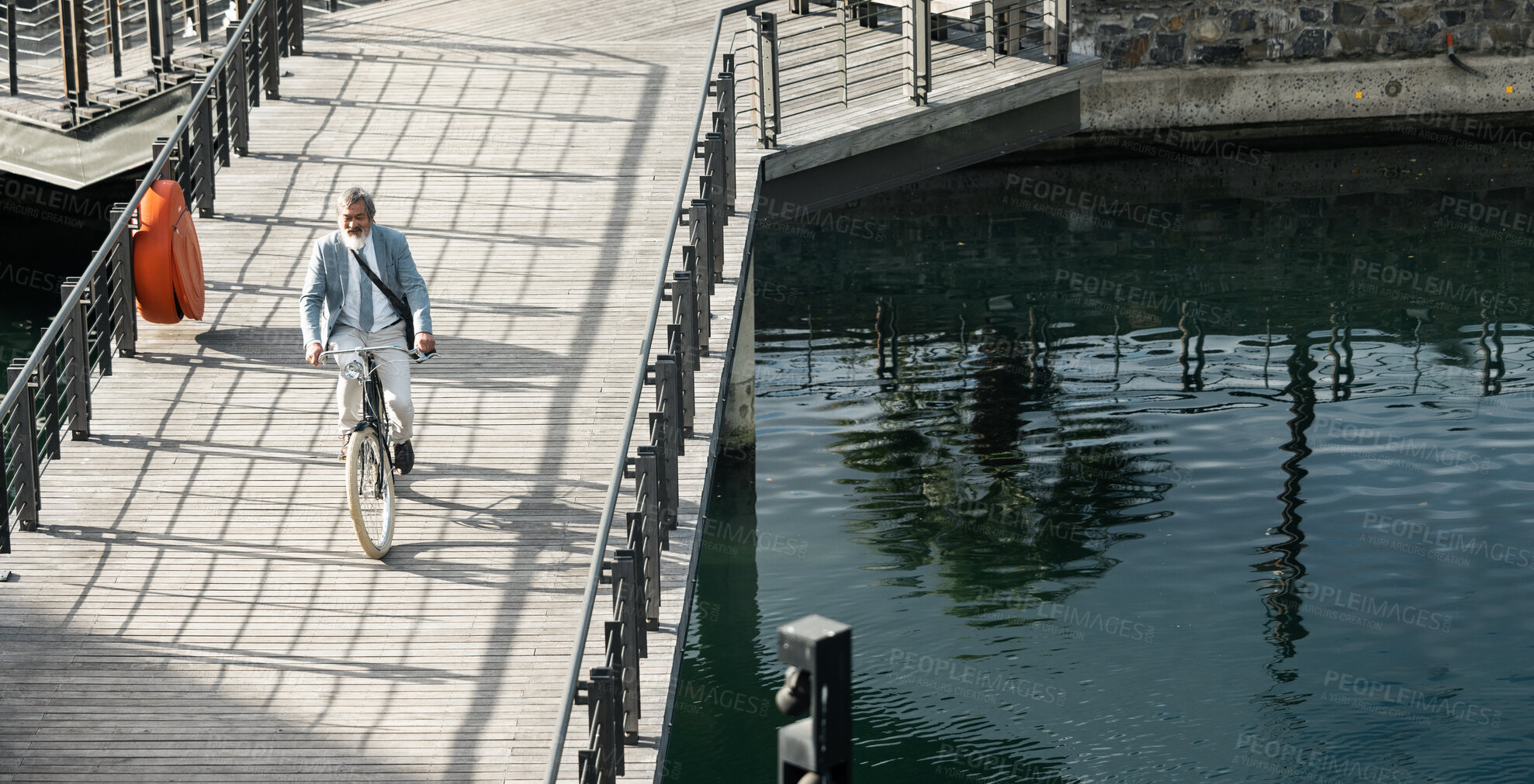 Buy stock photo Businessman, asian and eco bike travel on bridge for carbon neutral work transportation in China. Worker, cycling and river commute with senior executive on outdoor sustainability trip with bicycle.