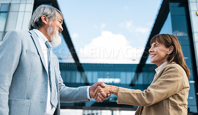 Buy stock photo Partnership, meeting and handshake with business people in city for global merger, collaboration or deal. Thank you, welcome or contract with ceo shaking hands with client for b2b, crm and leadership