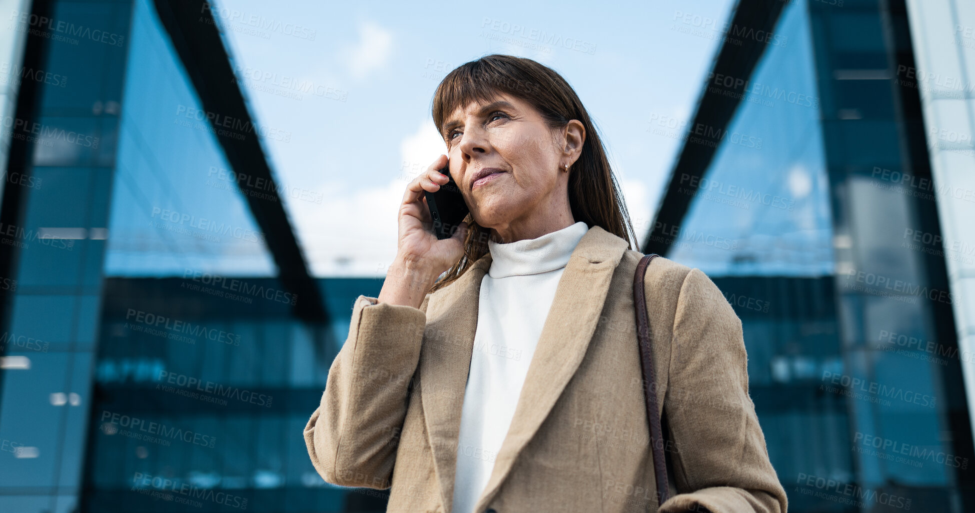 Buy stock photo Business, woman and phone call in the city of senior executive female with 5g communuication. Urban town, leading businesswoman and cellphone or mobile conversation with an aged lady outside
