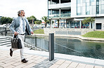 Businessman, running and work time in the city for urgent meeting, deadline or behind schedule. Elderly man having a run to the office for business deal, appointment or opportunity in the outdoors