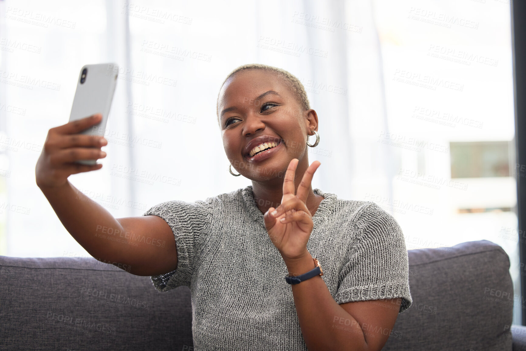 Buy stock photo Black woman, peace sign or phone selfie on house sofa, home or hotel living room for social media, online dating app or profile picture. Smile, happy or relax person on mobile photography technology