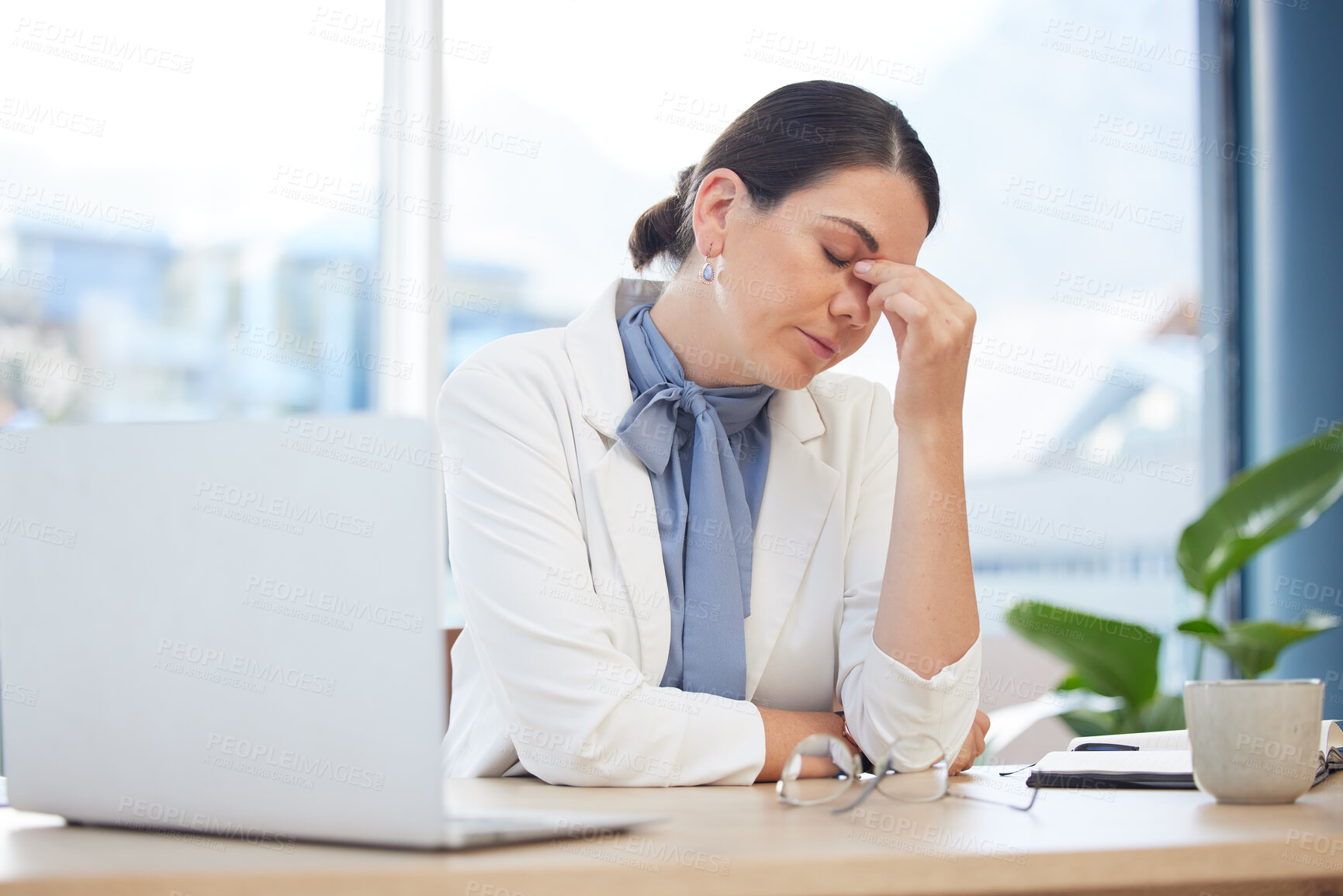 Buy stock photo Stress, burnout and healthcare with a doctor woman suffering from a headache while working on a laptop in a hospital. Mental health, medicine and medical with a female health professional in a clinic