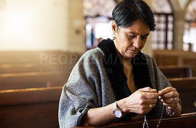 Buy stock photo Pray, senior woman and praying in church with a rosary for religion, worship and God praise, peaceful and calm. Holy, peace and prayer by Mexican female in chapel in Mexico for spiritual blessing