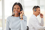Call center, telemarketing and black woman consulting for support, help and customer service at a professional company. Happy, smile and portrait of an African crm worker talking to people online