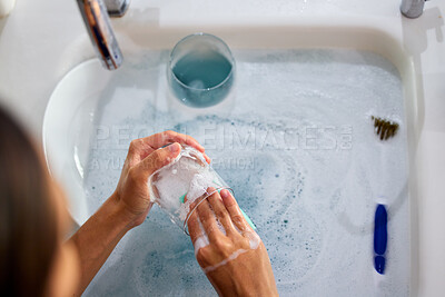 Buy stock photo woman hands, cleaning dishes and water in sink in kitchen for clean home morning routine. Bacteria, dirty wine glasses and foam cleaner for health safety, maid, housekeeper and domestic lifestyle