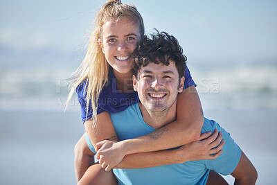 Buy stock photo Couple, portrait and piggy back at beach relaxing in exercise, workout and fitness clothes. Ocean, love and health of happy people enjoying active outdoor lifestyle break together with smile.