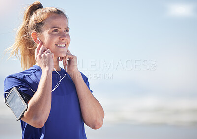 Buy stock photo Earphones, runner and woman in nature with phone streaming audio, music or podcast mock up. Sports, fitness and female from Canada listening to song, radio or workout track after running or training