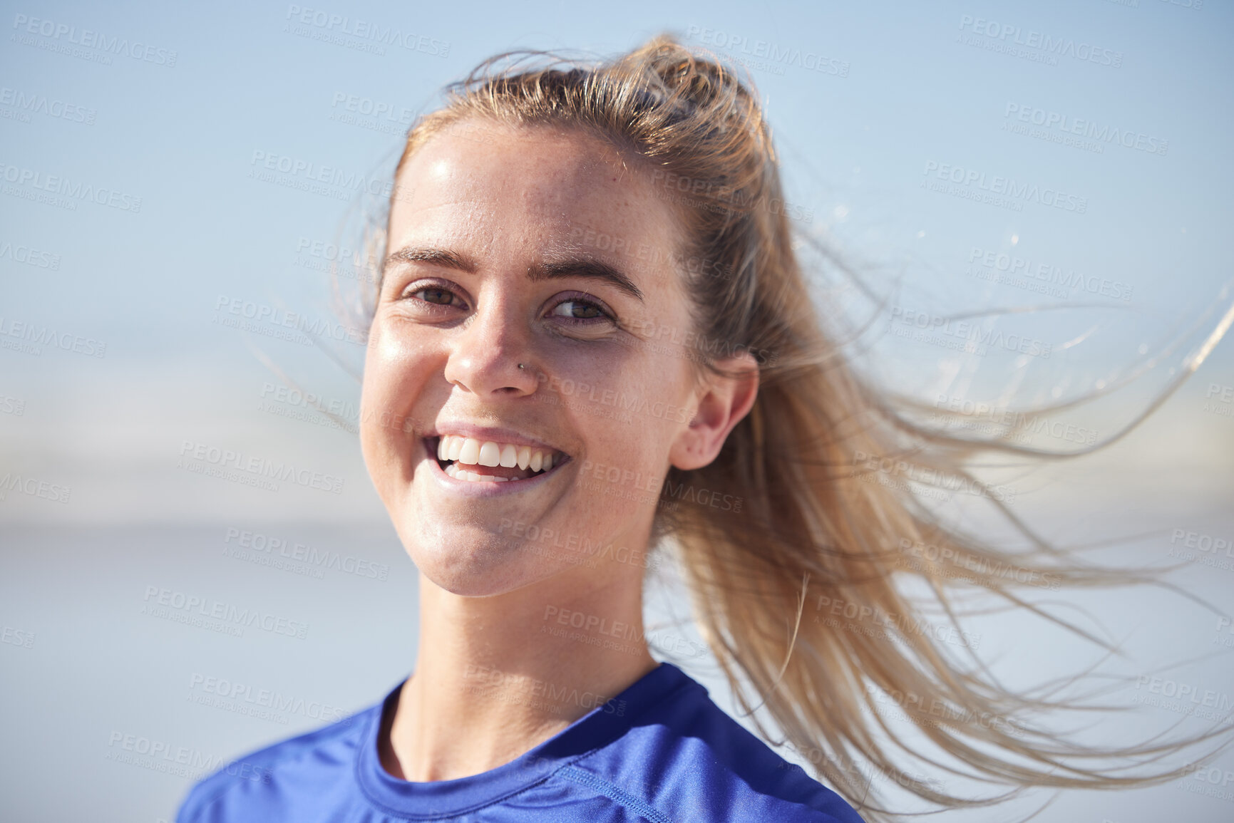 Buy stock photo woman, face and freedom happy on beach for relax mental health or vacation travel. Portrait of young girl, smile and laughing in calm blue sky background for ocean fresh air or relaxing summer