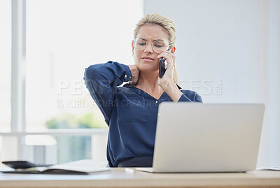 Buy stock photo Phone call, stress and neck pain with a business woman at work on a laptop in her office alone. Computer, posture and communication with a female employee working or talking on a mobile at her desk