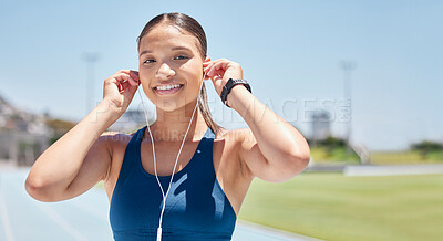 Buy stock photo Sports, music and woman at a stadium for running, health and exercise with audio, track and radio. Portrait, runner and motivation podcast at a running track for training, cardio and health workout