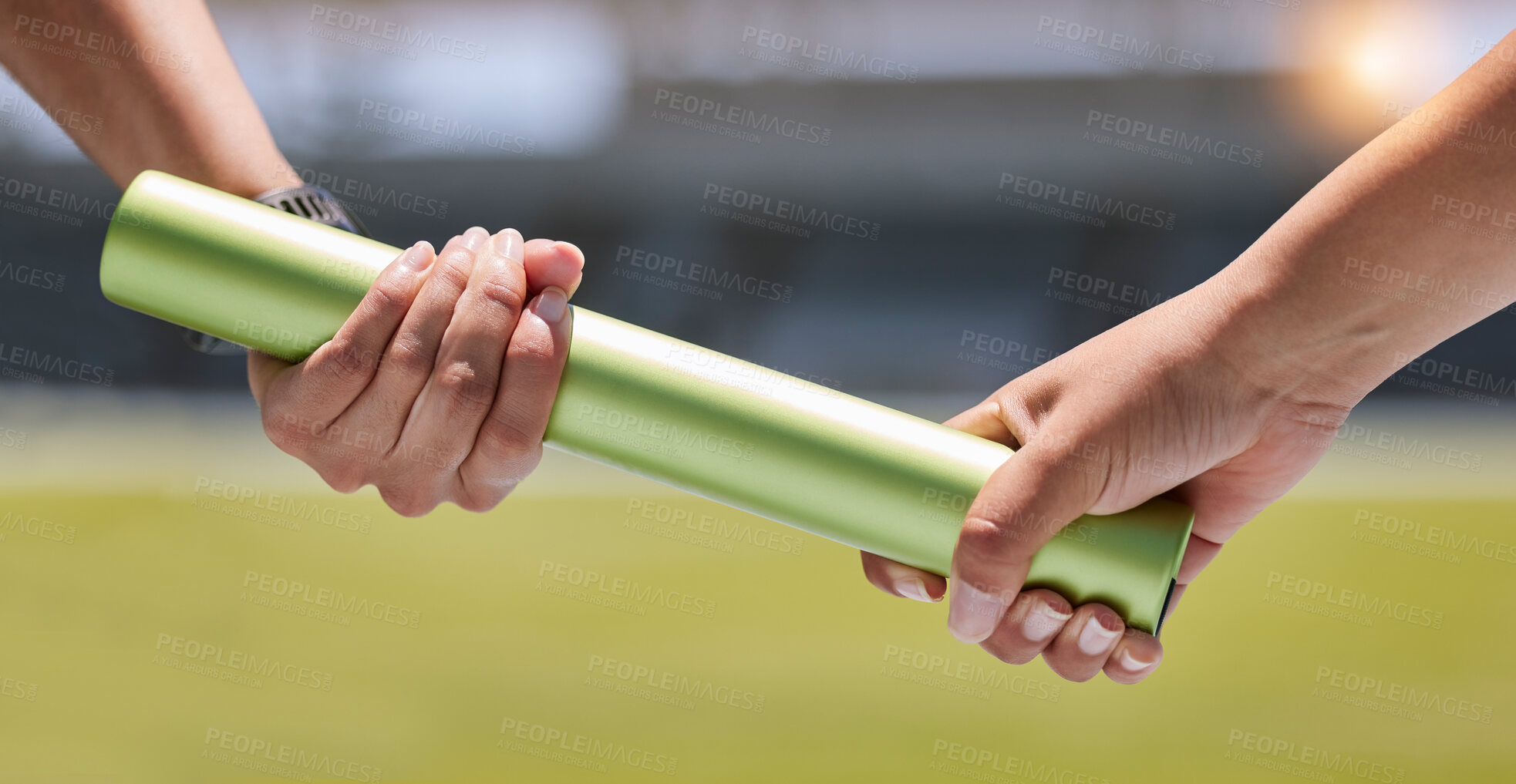 Buy stock photo Teamwork, relay race and hands on baton, fitness competition and women running on track and field. Sports, wellness and woman runner team with trust and collaboration for winning at race track event.