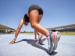 Woman, runner and fitness of a athlete about to start a run on a sport track outdoor. Exercise, sports and motivation for workout, training and running for exercise, healthy living and strong cardio