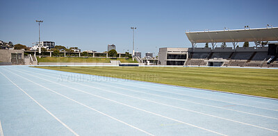 Buy stock photo Race track, athletic and empty outdoor sports stadium for marathon, competition or olympics. Sport, no people and field at outside arena for training, exercise or workout for professional athletes.