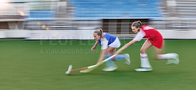 Buy stock photo Hockey, action and running women in a game, competition or sports event for goal with speed, energy and motivation challenge. Stadium, turf field and athlete people run together with stick and a ball