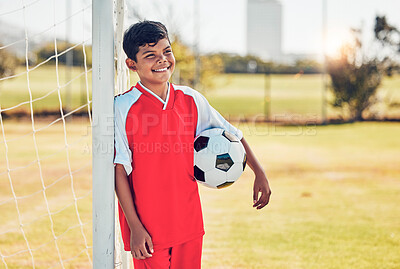 Buy stock photo Soccer player, field and child with happy game, competition or training on pitch near goal post with fitness health. Kid with soccer ball thinking on a football field for exercise, workout or sports