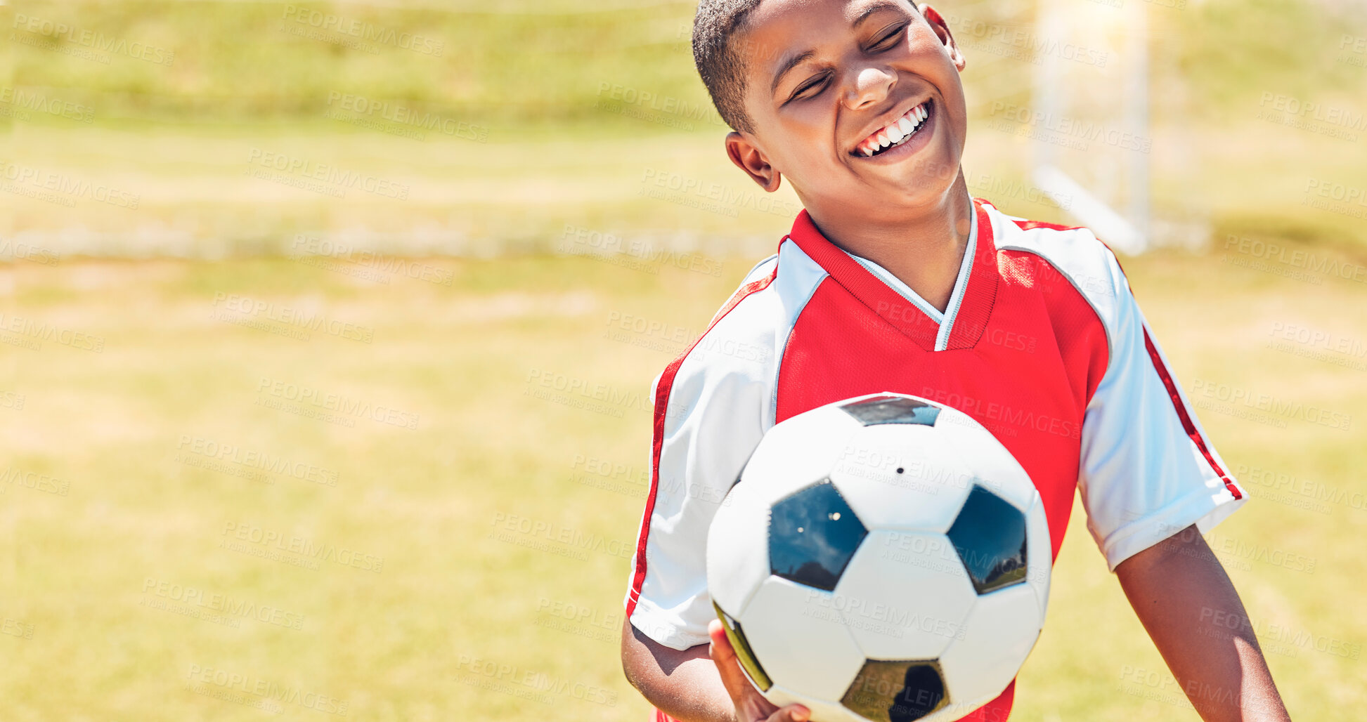 Buy stock photo Happy, soccer and child on sport field with soccer ball excited for training, game or competition with smile. Black kid, football and health of young athlete on grass ready to play match for fitness.