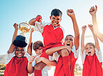 Soccer, celebration and kids team with trophy on soccer field, happy and excited at winning game. Sports, boy children goal and success in teamwork at football with gold medal award with winner smile