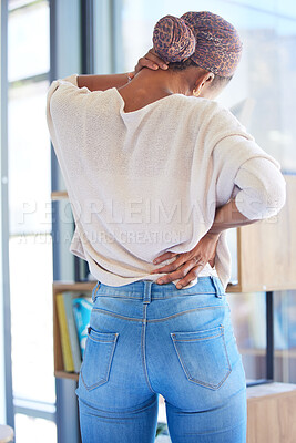 Buy stock photo Black woman, back and neck pain in stress, tired or overworked from working at home. African American female suffering from muscle tension, discomfort or ache in burnout or mental health issues