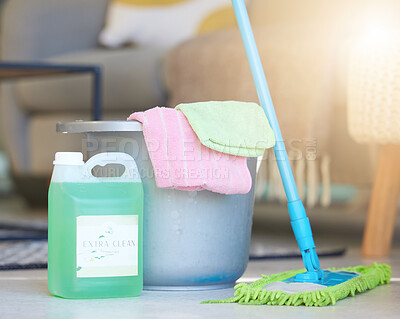 Buy stock photo Cleaning, soap detergent product and bucket with mop for domestic work, household chores and sanitizing house to get rid of germs, bacteria and dirt. Clean living room, shiny floor and spotless house