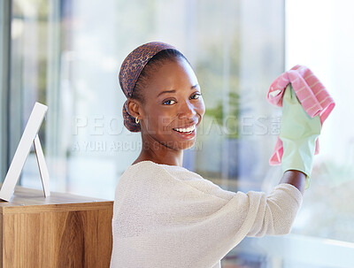 Buy stock photo Portrait, black woman and cleaning glass in home with smile for hygiene, fresh or wipe clear with cloth. African American female, lady and cleaner being happy, domestic and window dusting and chores