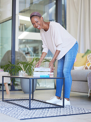 Buy stock photo Black woman, books and portrait of student in living room pick up book or business startup guide for reading. Learning, education and female from Nigeria with textbook on table in home for studying.