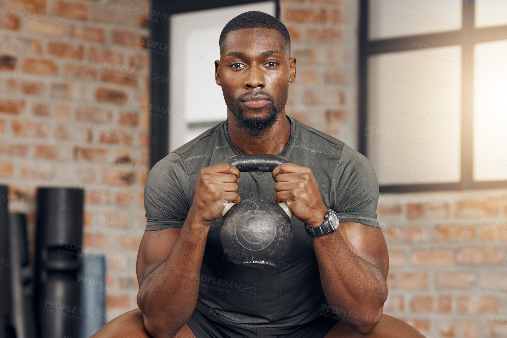 Buy stock photo Fitness, gym and portrait of a black man with a kettlebell for strength training for wellness. Motivation, sports and strong African athlete doing a exercise or workout with weights at a health club 