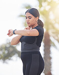 Young woman, fitness and heart rate, neck pulse and wellness of training in urban city. Sports runner, athlete and indian girl check smart watch, healthy lifestyle progress and exercise time tracking