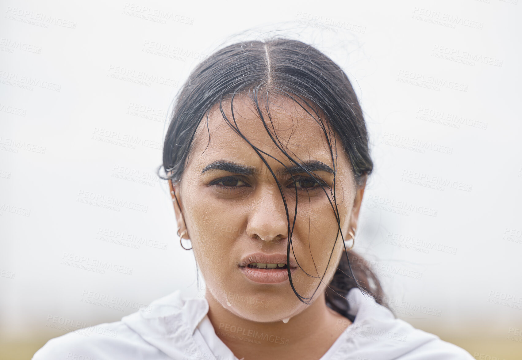 Buy stock photo Rain, fitness and face portrait of woman in training resting on a cardio workout break outdoors in nature. Runner, winter and healthy Indian girl sweating in raining weather after sports exercise