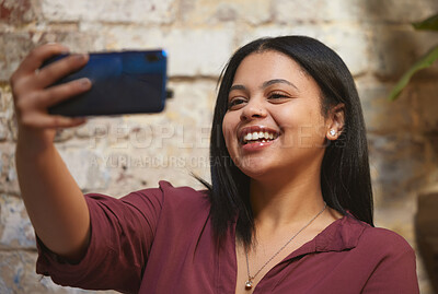 Buy stock photo Smile, phone and selfie with woman by wall for social media, contact and post online. Internet, technology or 5g mobile with happy girl taking picture for relax, confidence and peace on break or rest