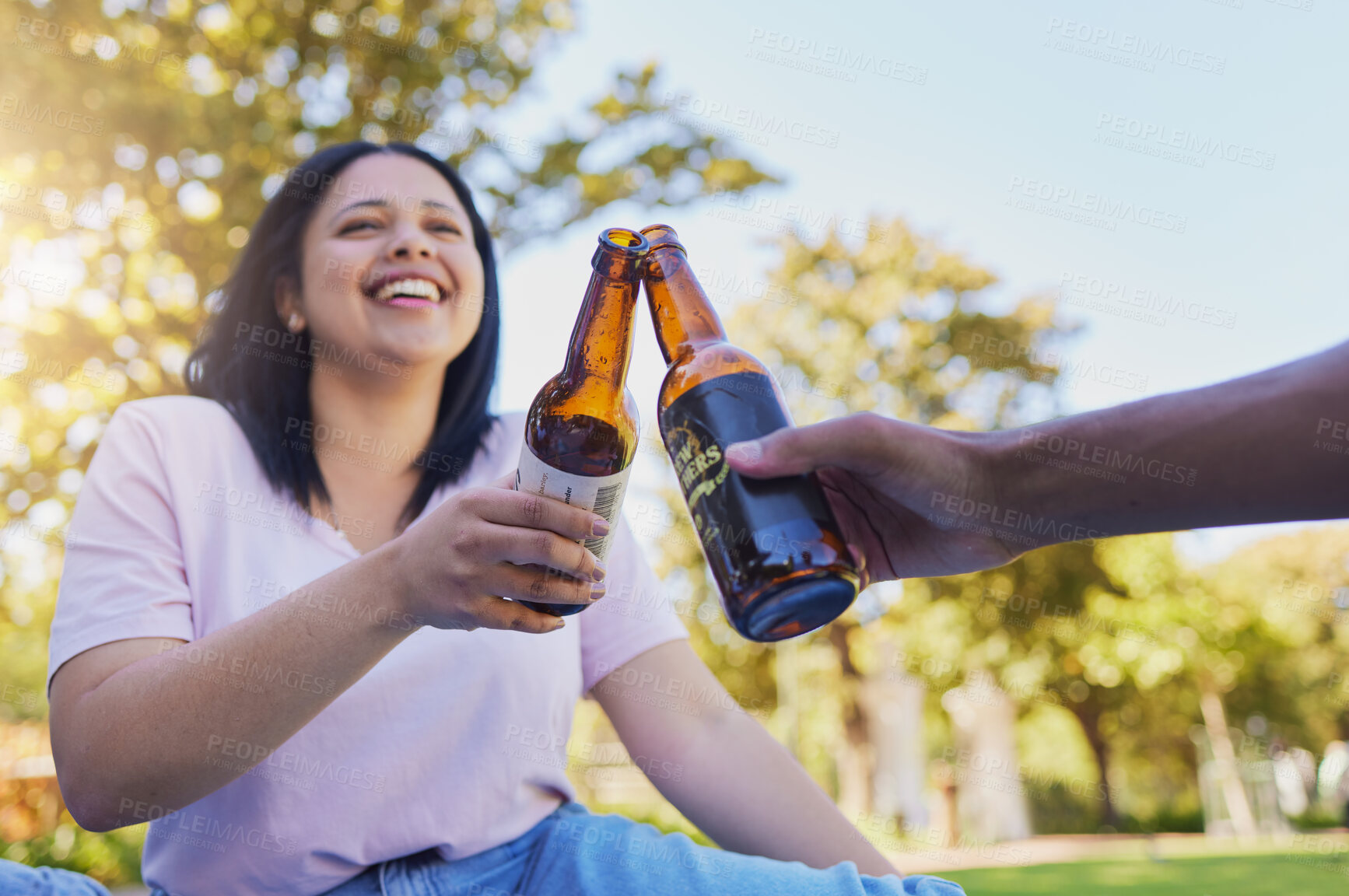 Buy stock photo Happy friends, beer and toast in celebration at the park for holiday, summer and freedom to travel together. Smile of people cheers with alcohol in picnic, vacation and relax by in garden in summer