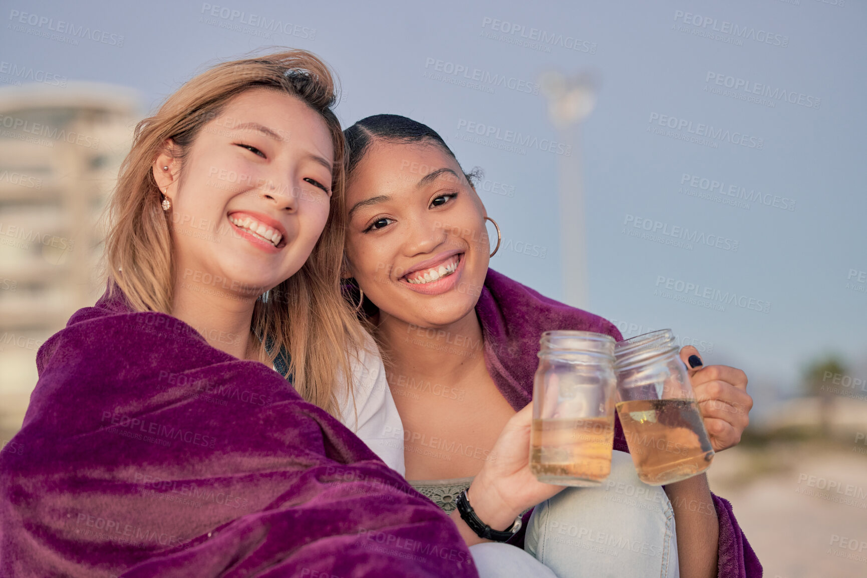 Buy stock photo Friends cheers, blanket and relax together in nature for quality time or freedom bonding outdoors. Girlfriends, happy and toasting happiness, love and celebration portrait for memories with drink