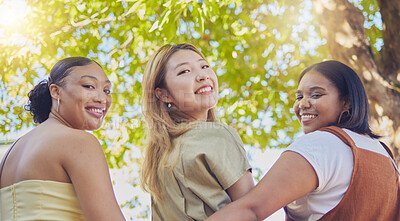 Buy stock photo Young women, friends and smile in park portrait together in diversity, happy and summer by trees. Group, woman and happiness in freedom on vacation, holiday or walking in nature by tree in sunshine
