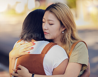 Buy stock photo Love, women and hug for connect, sad and support for understanding with problem, compassion and calm together. Asian woman, girl and embrace friend, loving and help to console in kind relationship