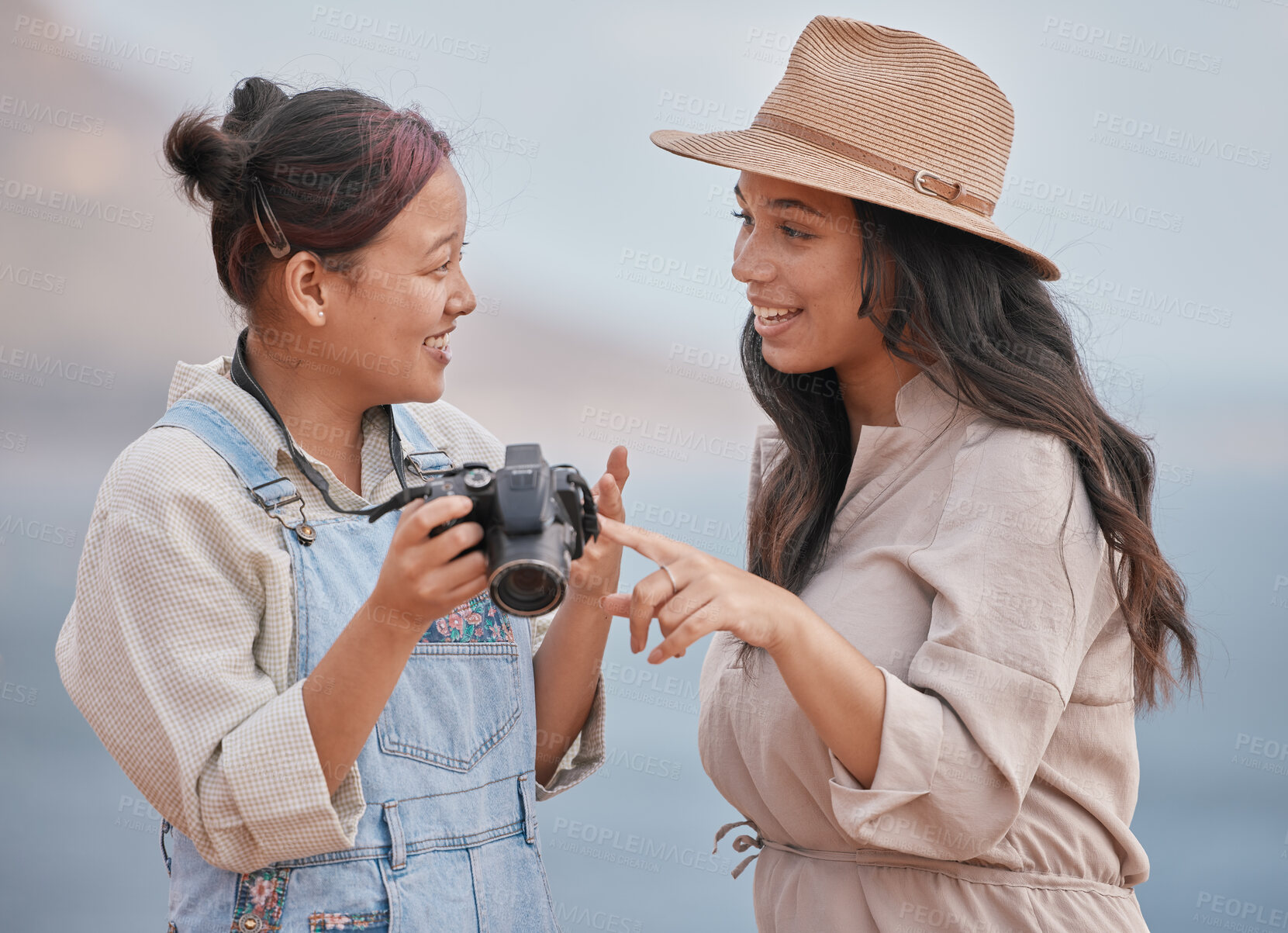 Buy stock photo Photography, happy and friends with a camera for holiday in nature of Mexico together. Smile, travel and photographer with memory on vintage camera with a woman by the sea or ocean for vacation