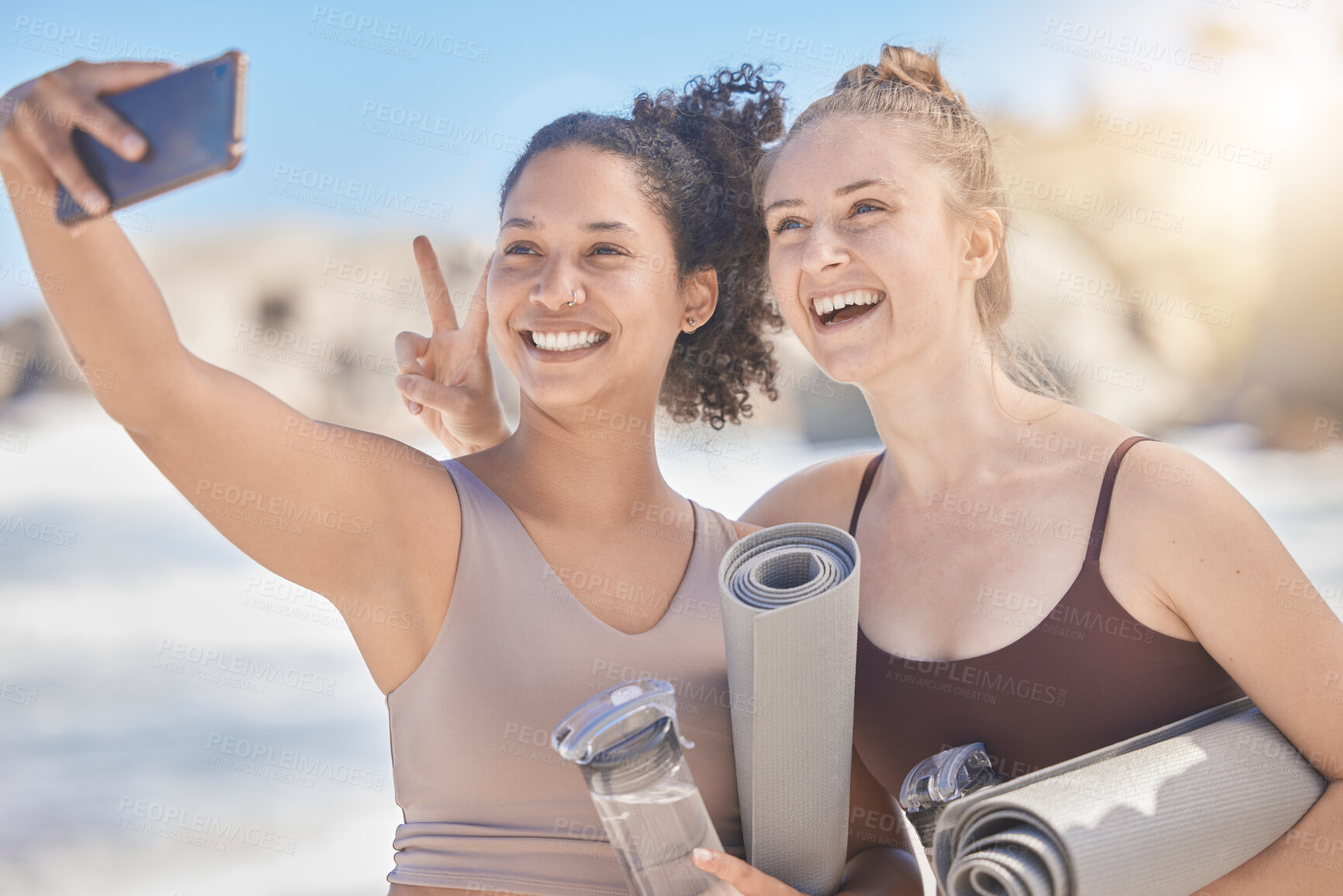 Buy stock photo Woman, friends and phone selfie in yoga with smile for healthy exercise, training or workout at the beach. Women in fitness taking a photo with mobile smartphone for happy moments together outside