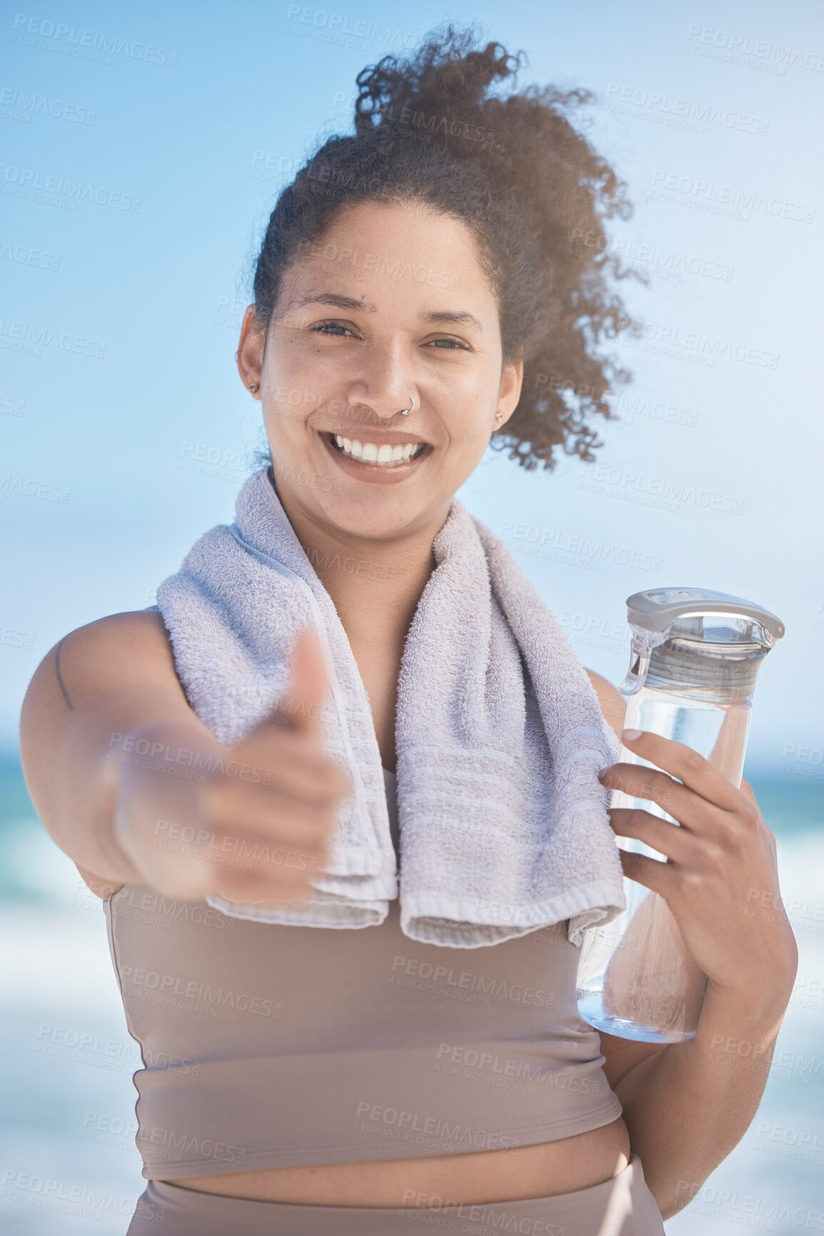 Buy stock photo Thumbs up, water bottle and black woman in fitness, workout or training success, achievement and goal. Sports, runner girl on beach portrait with thank you, yes and like hand sign for healthy life