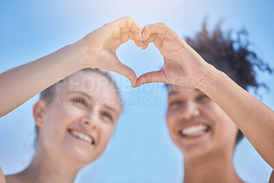 Buy stock photo Friends, smile and heart hands on blue sky, women happy together with love and support in summer sun. Woman, girl friend and happiness, hands join to heart sign for friendship, solidarity and trust.