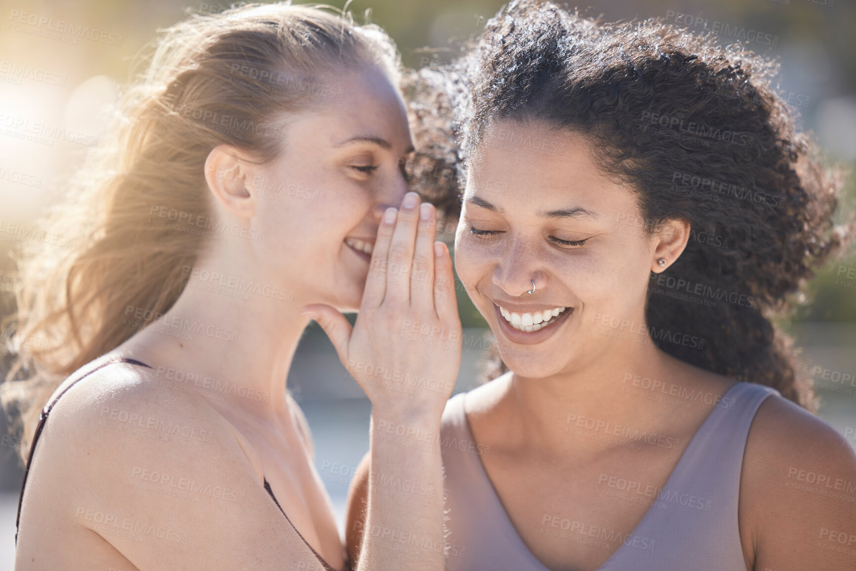 Buy stock photo Woman friends, whisper secret and summer for joke, funny or comic story, outdoor together and sunshine. Black woman listening to crazy gossip, talk or conversation from happy friend talking in ear
