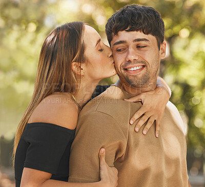 Buy stock photo Happy couple, love and kiss on cheek outdoor in nature park for vacation, adventure and quality time together in summer. Commitment, security and fresh air for healthy marriage with a man and woman