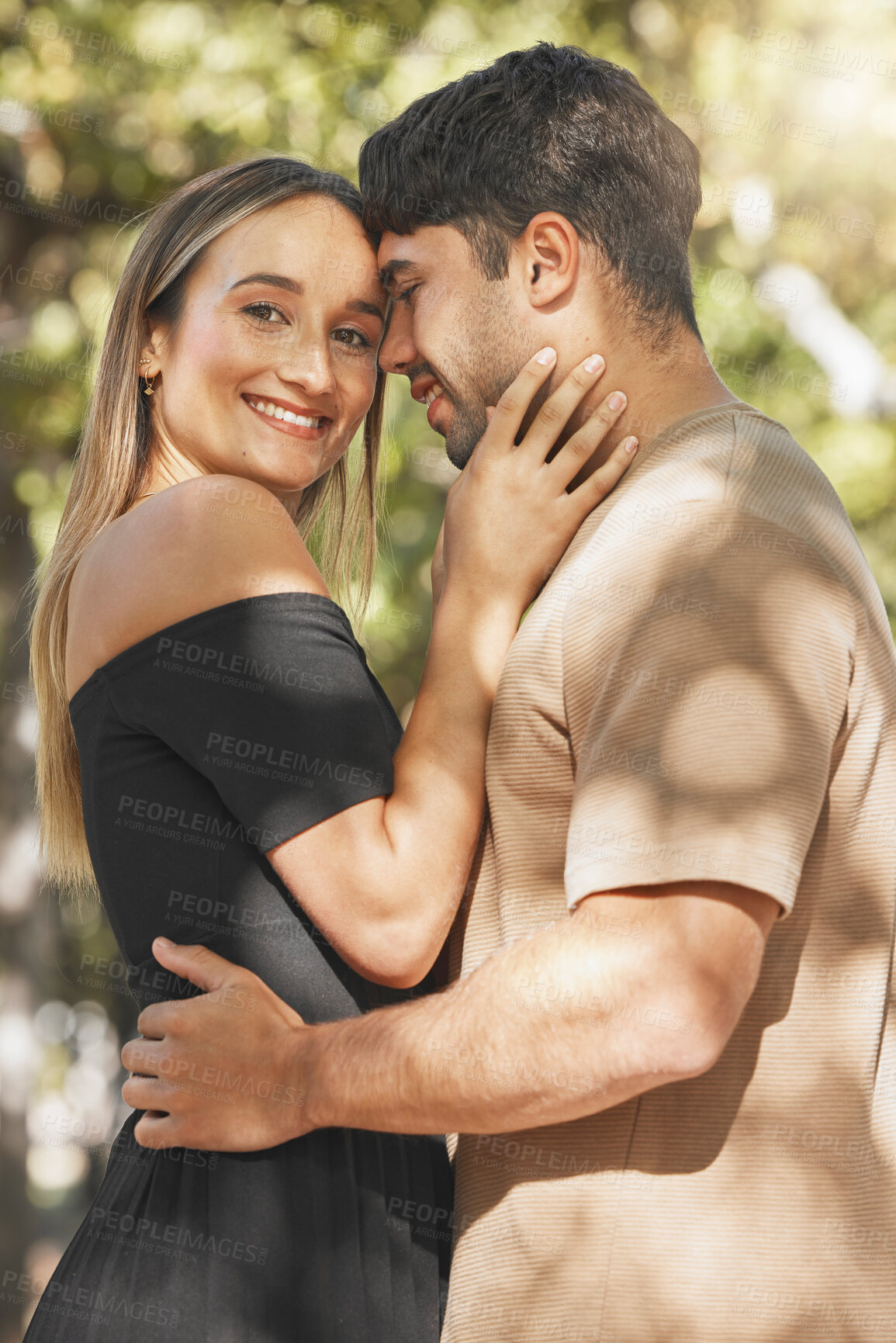 Buy stock photo Love, couple and smile together, happy and outdoor being loving, bonding and embrace. Romance, man and woman with hug, happiness for relationship and dating with quality time, romantic and affection.