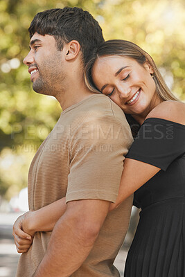 Buy stock photo Nature, love and happy woman hugging her husband from behind while on a romantic outdoor date. Happiness, smile and couple from Mexico embracing with care while on walk in a green garden or park.