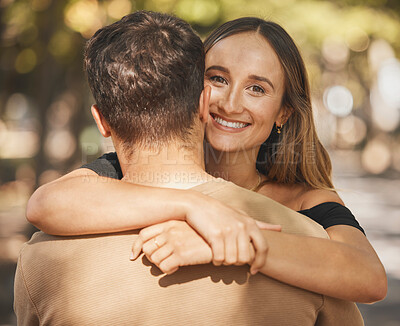 Buy stock photo Couple, hug and love with support in a park, smile and happy on outdoor date together in summer. Portrait of trust, happiness and woman with man hugging with affection, care and compassion in nature 