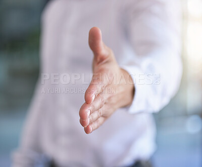 Buy stock photo Handshake, deal and welcome with a business man offering his hand in greeting, promotion or collaboration. Meeting, thank you and partnership with a male employee shaking hands in the office