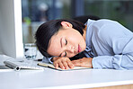 Burnout, tired and business woman sleeping on the desk in her modern office while planning a strategy. Fatigue, overworked and professional employee taking nap at workplace while working on a project