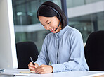 Call center, customer service and writing with an asian woman consultant working in a telemarketing office. Contact us, computer and receptionist with a female assistant taking notes for sales