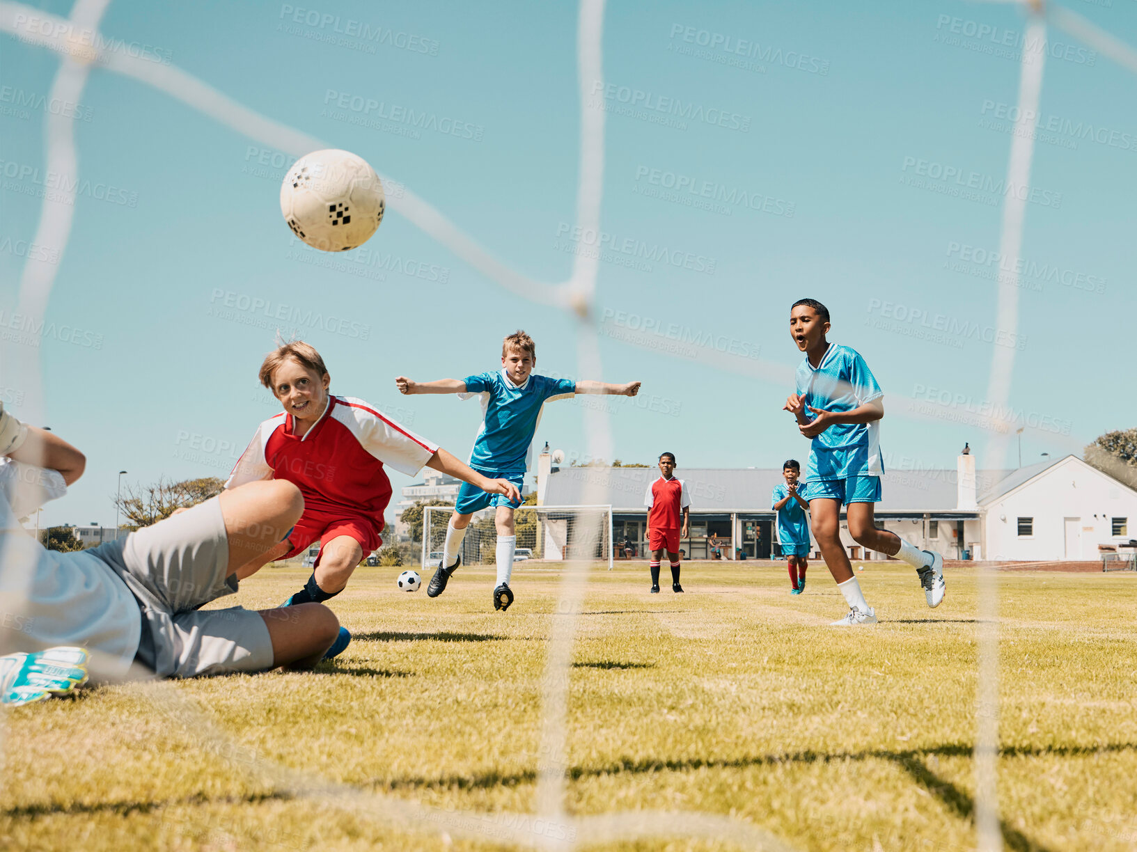 Buy stock photo Soccer, children and sports with a boy team playing a game on a grass pitch or field for competition or fun. Football, fitness and training with kids outdoor to play a competitive sport match
