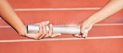 Buy stock photo Hands, baton and relay race with a sports woman team passing equipment during a competitive track event. Fitness, training and running with a female athlete and teamwork partner racing together