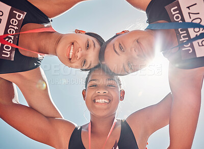Buy stock photo Sports, teamwork and fitness with a girl group standing in a circle huddle on a blue sky from below. Health, face and portrait with a female team together for wellness, exercise or training outdoor