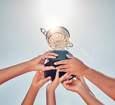 Buy stock photo Teamwork, sports and hands of people with trophy for winner, achievement and champion success. Support, community and diversity with women and award for training, commitment and collaboration 